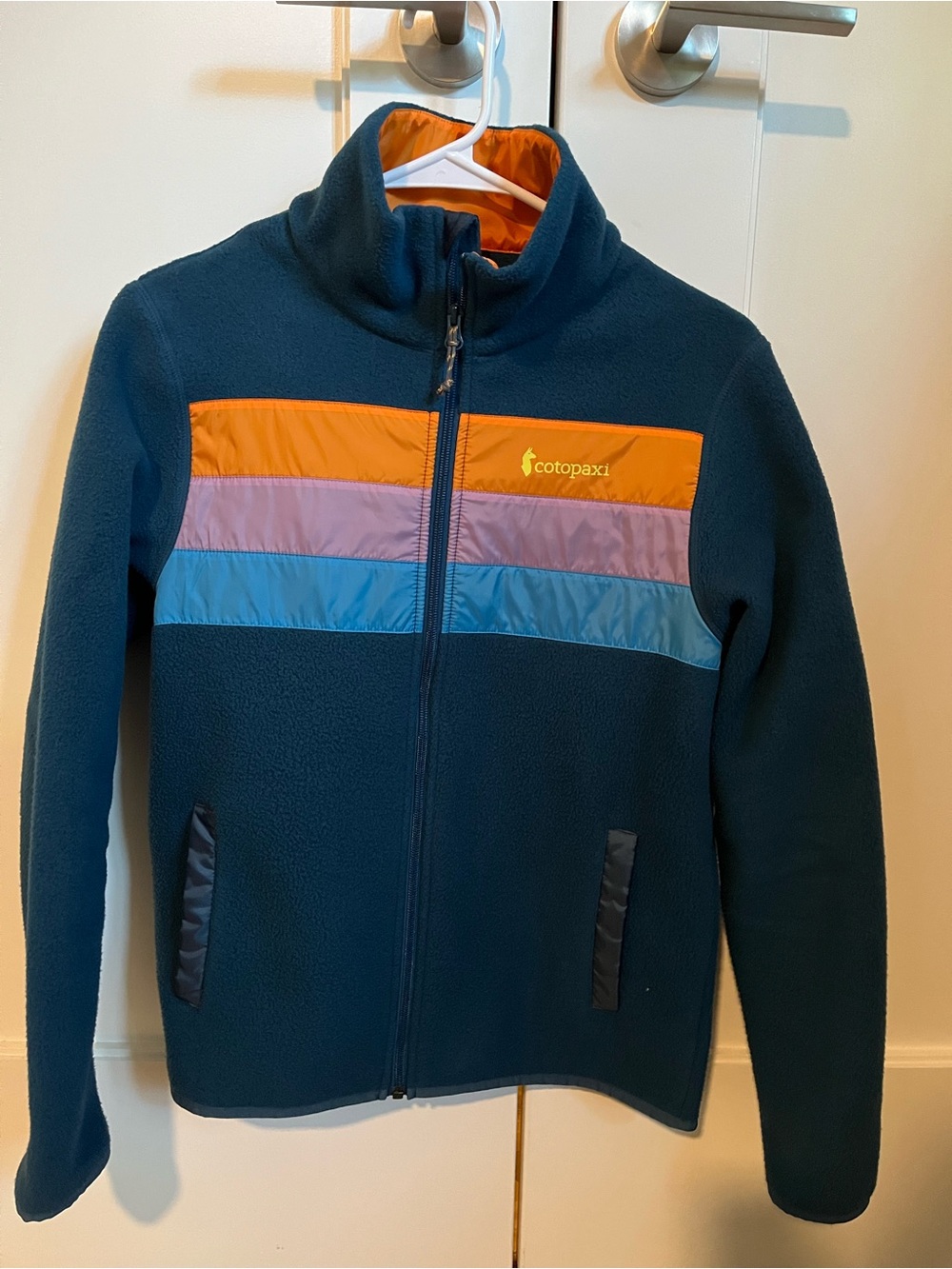cotopaxi Navy Blue Kids Fleece Jacket with Orange, Purple & Light Blue Stripes